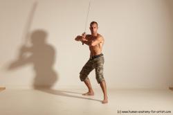 Fighting with sword Man White Moving poses Muscular Short Brown Dynamic poses Academic