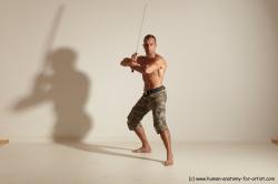 Fighting with sword Man White Moving poses Muscular Short Brown Dynamic poses Academic