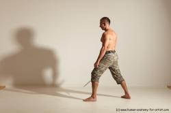 Fighting with sword Man White Moving poses Muscular Short Brown Dynamic poses Academic