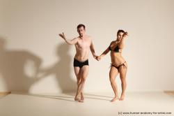 Swimsuit Woman - Man White Slim Brown Dancing Dynamic poses Academic
