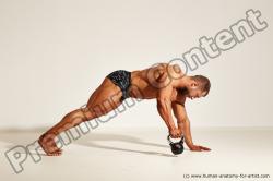 Swimsuit Gymnastic poses Man White Laying poses - ALL Muscular Short Brown Laying poses - on stomach Dynamic poses Academic