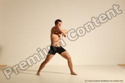 Underwear Fighting Man White Dynamic poses Academic