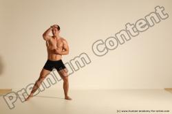 Underwear Fighting Man White Athletic Short Brown Dynamic poses Academic