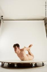 Nude Man White Laying poses - ALL Slim Short Laying poses - on stomach Black Multi angles poses Realistic