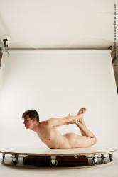 Nude Man White Laying poses - ALL Slim Short Laying poses - on stomach Black Multi angles poses Realistic