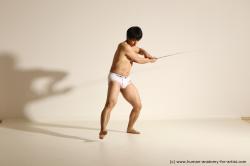 Underwear Fighting with sword Man Asian Athletic Short Black Dynamic poses Academic