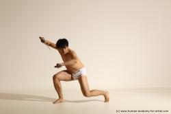 Underwear Fighting Man Asian Athletic Short Black Dynamic poses Academic