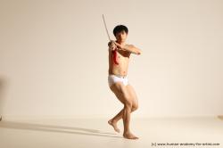 Underwear Fighting with sword Man Asian Slim Short Black Dynamic poses Academic