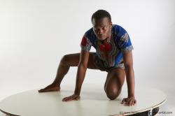 Casual Man Black Kneeling poses - ALL Slim Short Kneeling poses - on one knee Black Standard Photoshoot Academic