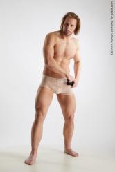 Underwear Fighting with knife Man Muscular Medium Blond Standard Photoshoot Academic