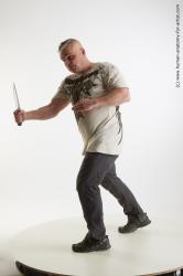 Casual Fighting with knife Man White Average Short Grey Standard Photoshoot Academic