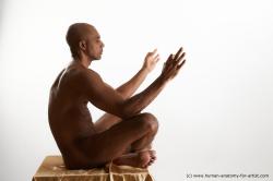Nude Man Black Sitting poses - simple Athletic Bald Sitting poses - ALL Standard Photoshoot Realistic
