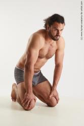 Underwear Man Black Kneeling poses - ALL Muscular Medium Brown Kneeling poses - on both knees Standard Photoshoot Academic