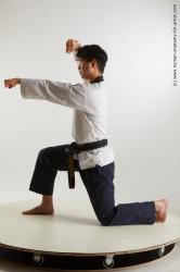 Sportswear Fighting Man Asian Kneeling poses - ALL Slim Short Kneeling poses - on one knee Black Standard Photoshoot Academic
