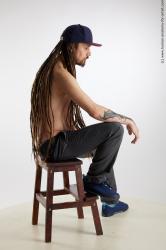 Casual Man White Sitting poses - simple Slim Brown Sitting poses - ALL Dreadlocks Standard Photoshoot Academic