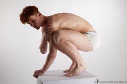 Underwear Man White Slim Short Red Sitting poses - ALL Sitting poses - on knees Standard Photoshoot Academic