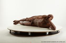Nude Man Black Laying poses - ALL Athletic Bald Laying poses - on side Standard Photoshoot Realistic