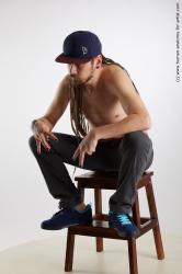 Casual Man White Sitting poses - simple Slim Brown Sitting poses - ALL Dreadlocks Standard Photoshoot Academic