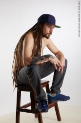 Casual Man White Sitting poses - simple Slim Brown Sitting poses - ALL Dreadlocks Standard Photoshoot Academic