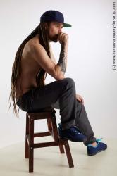 Casual Man White Sitting poses - simple Slim Brown Sitting poses - ALL Dreadlocks Standard Photoshoot Academic