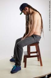 Casual Man White Sitting poses - simple Slim Brown Sitting poses - ALL Dreadlocks Standard Photoshoot Academic