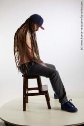 Casual Man White Sitting poses - simple Slim Brown Sitting poses - ALL Dreadlocks Standard Photoshoot Academic