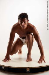 Swimsuit Man Black Kneeling poses - ALL Athletic Short Kneeling poses - on one knee Black Standard Photoshoot Academic