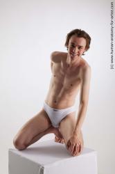 Kneeling reference poses Tony