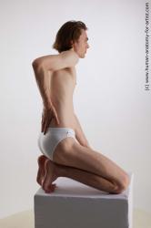 Kneeling reference poses Tony