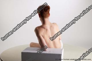 sitting reference feral 03