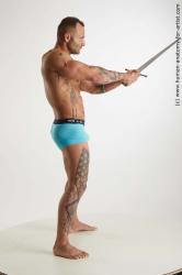 Fighting reference poses Garrott