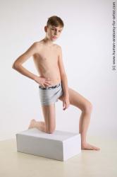 Kneeling reference poses Archie